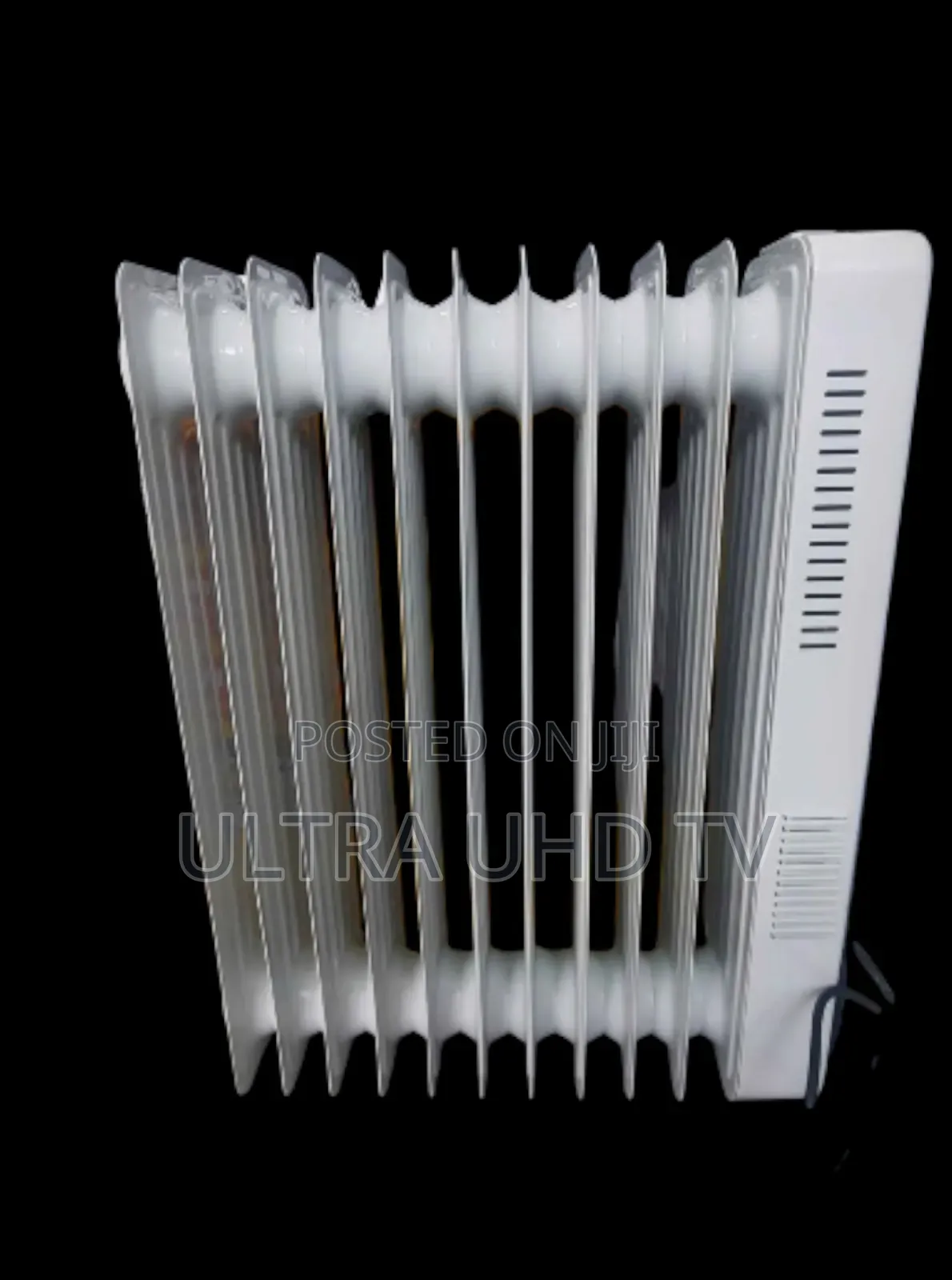 Electric Oil-Filled Radiator Heater, Also Known as a Column Heater.