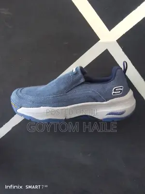 Skechers Slip Ons.