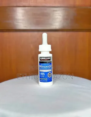 Minoxidil Kirkland ለወንድም ለሴትም