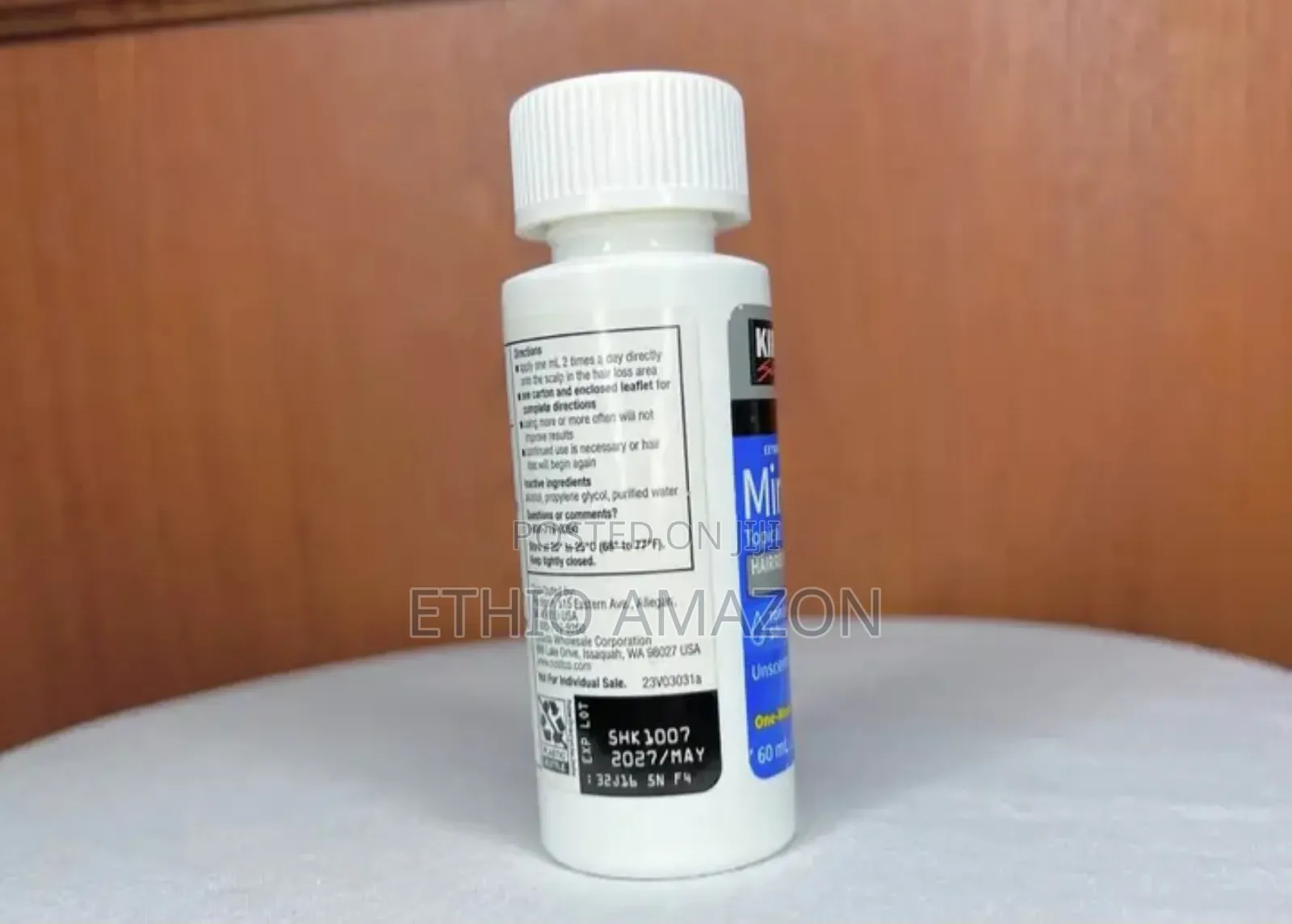 Minoxidil Kirkland ለወንድም ለሴትም