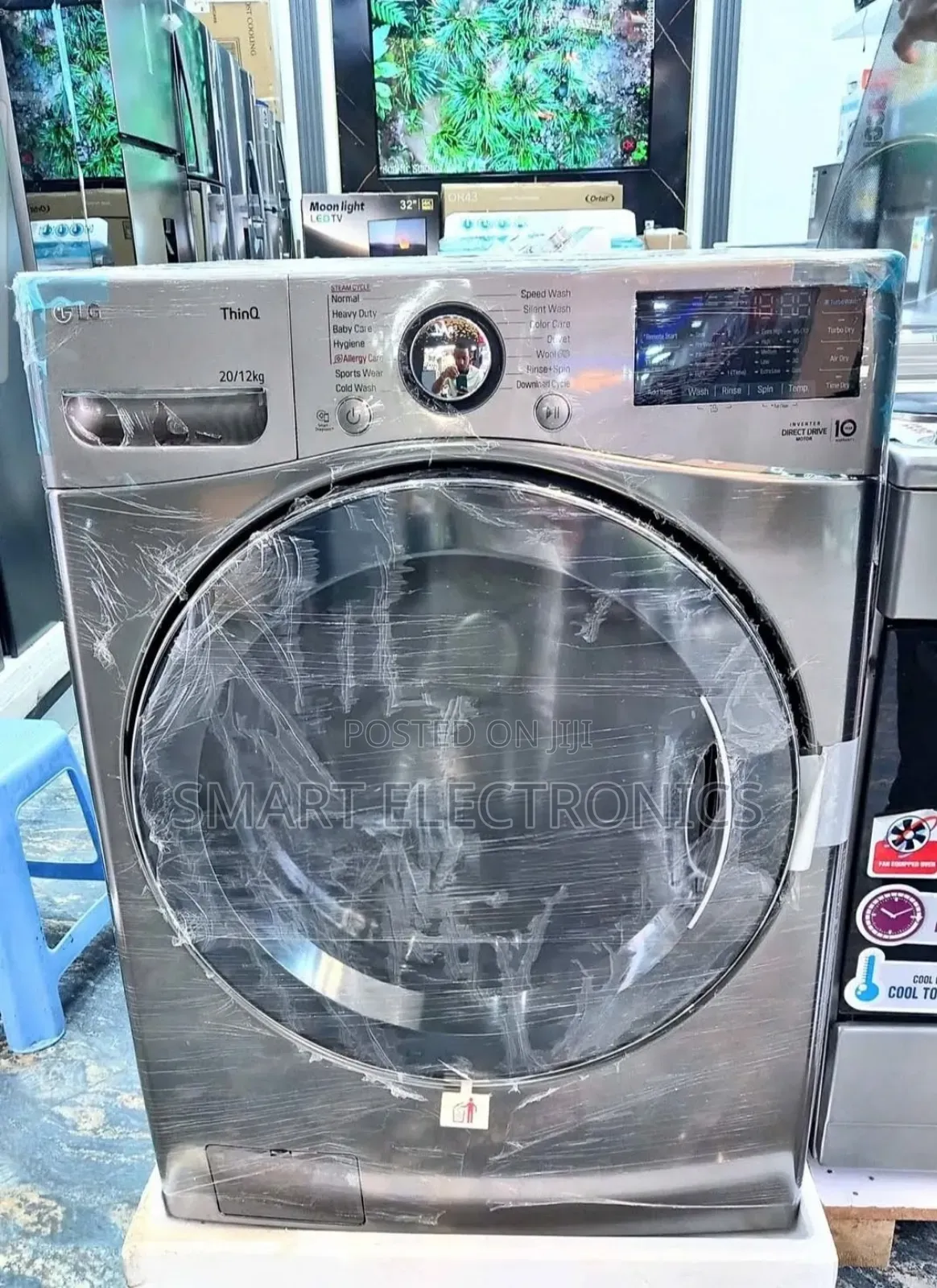 Lg Front-Load Washer and Dryer Combination Unit. It Has a Large