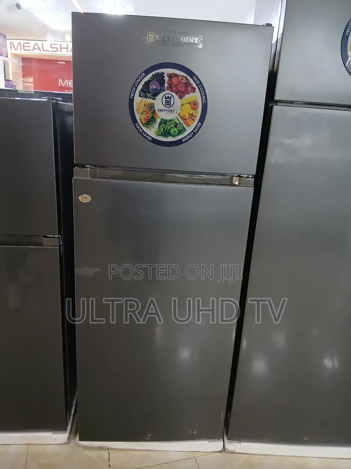 Westpoint Top-Freezer Refrigerator. It Features "Fresh Longer,""Fast