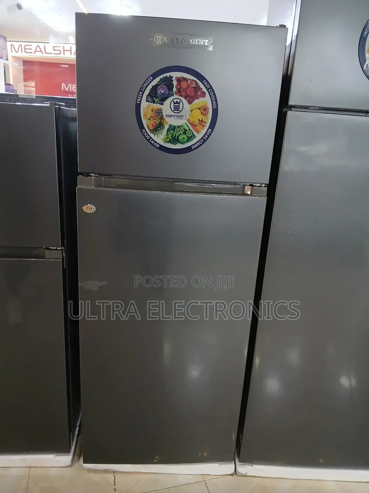 Westpoint Top-Freezer Refrigerator. It Features "Fresh Longer,""Fast