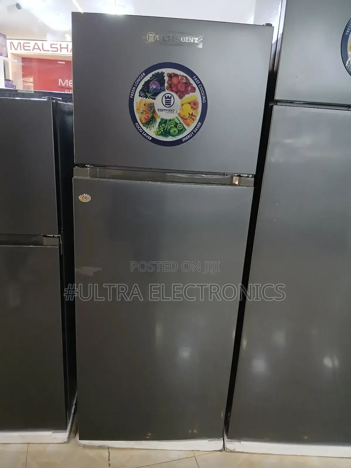 Westpoint Top-Freezer Refrigerator. It Features "Fresh Longer,""Fast