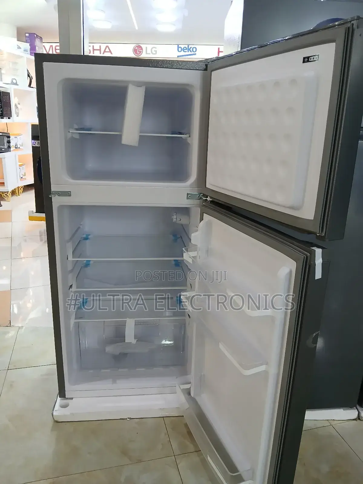 Westpoint Top-Mount Refrigerator. Key Features Include: