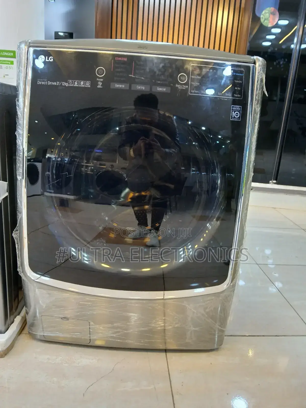 Lg Front Load Fully Automatic Washer/Dryer.Capacity: 21/12 Kg Washing
