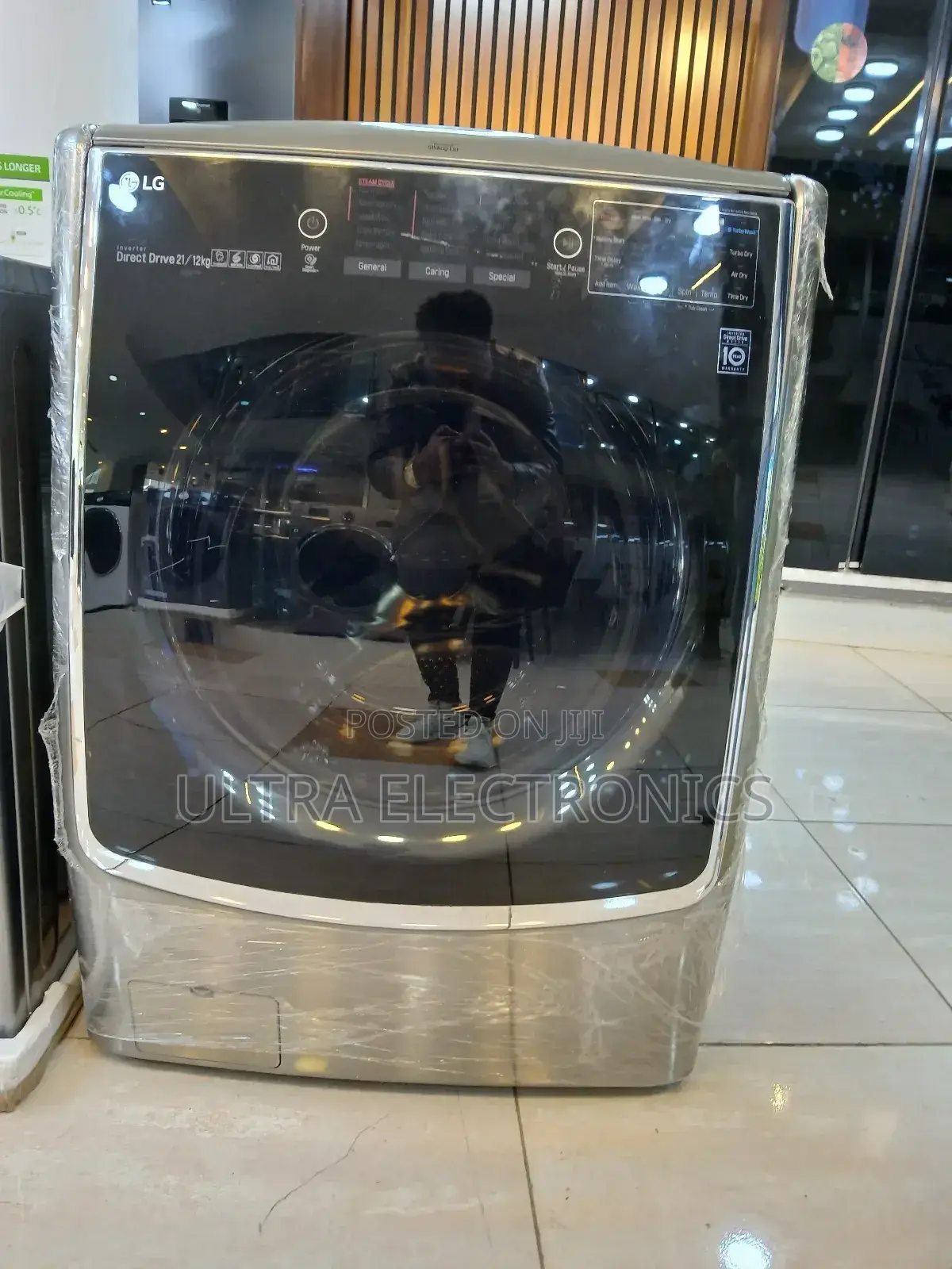 Lg Front Load Fully Automatic Washer/Dryer.Capacity: 21/12 Kg Washing