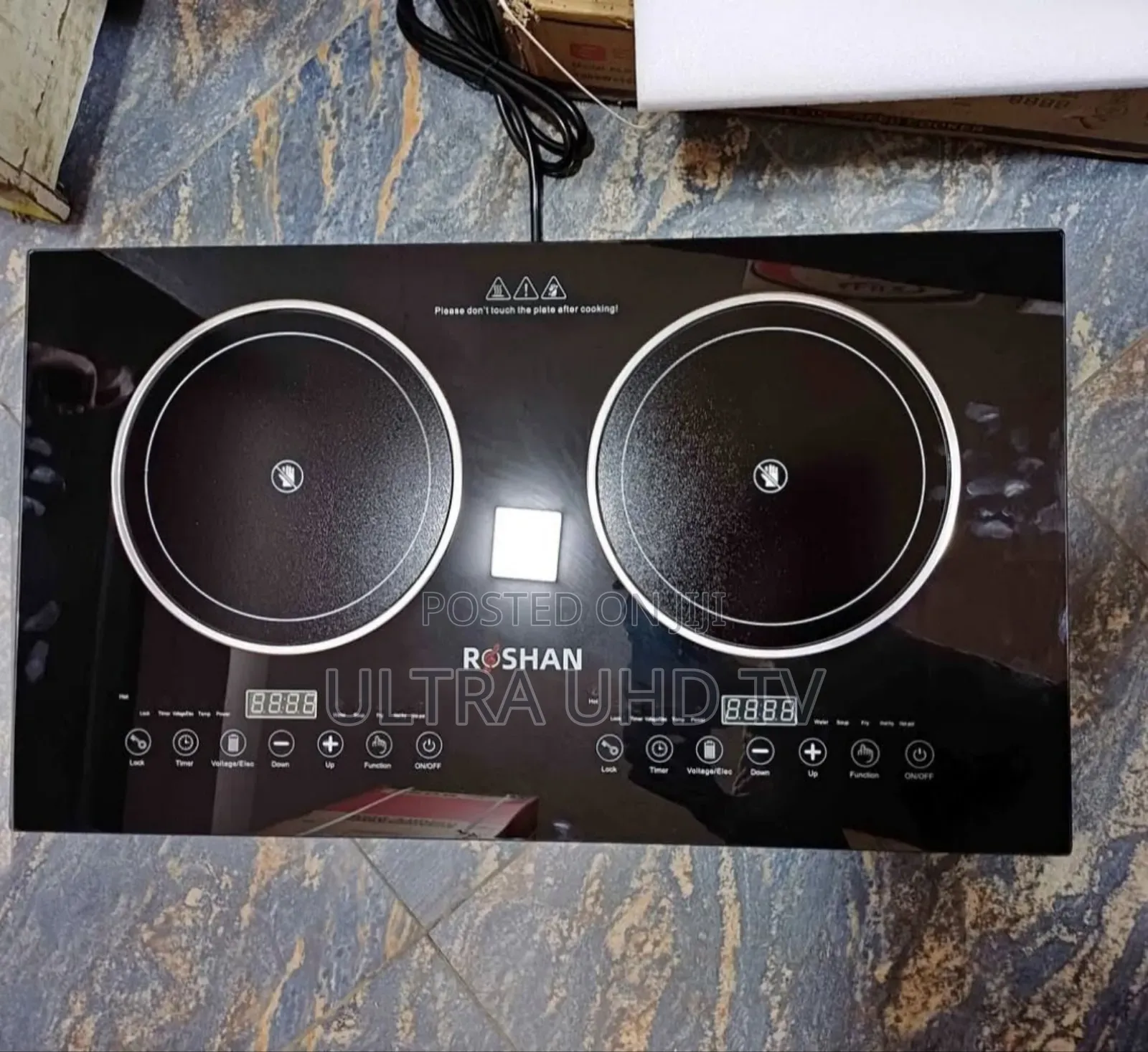 Roshan Digital Touch Stove, Likely an Induction or Ceramic Cooktop.