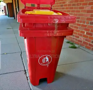 Red Plastic Outdoor Garbage Bin, Likely Around 100 Liters in Capacity,