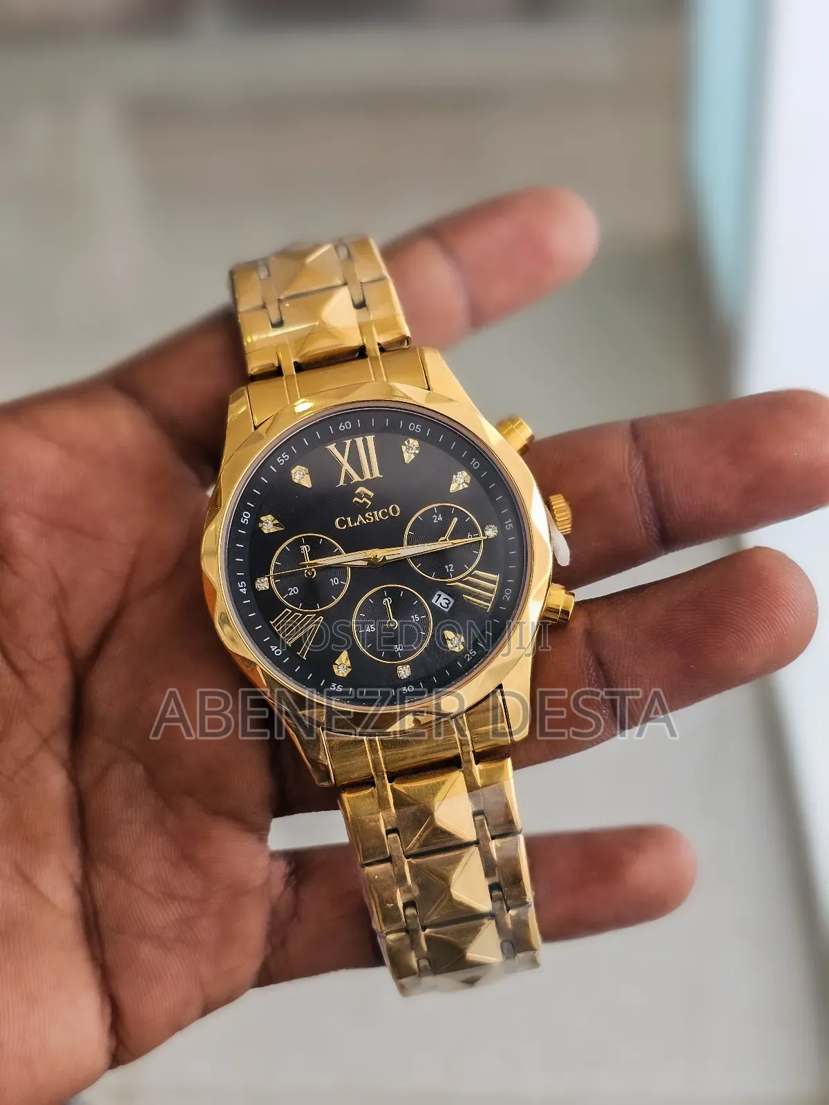 Gold-Tone Stainless Steel "Clasico" Chronograph Watch.
