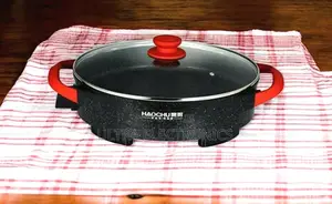 Haochu Ceramic Pizza Pan. Ideal for Shawarma, Bread, Fried Foods.
