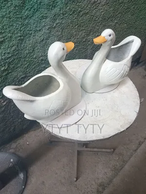 Fiberglass በዳክዬ ቅርፅ የተሰራ የአበባ ማስቀመጫ