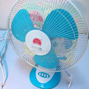 Changli Crown Table Fan It Has a Blue and White Plastic