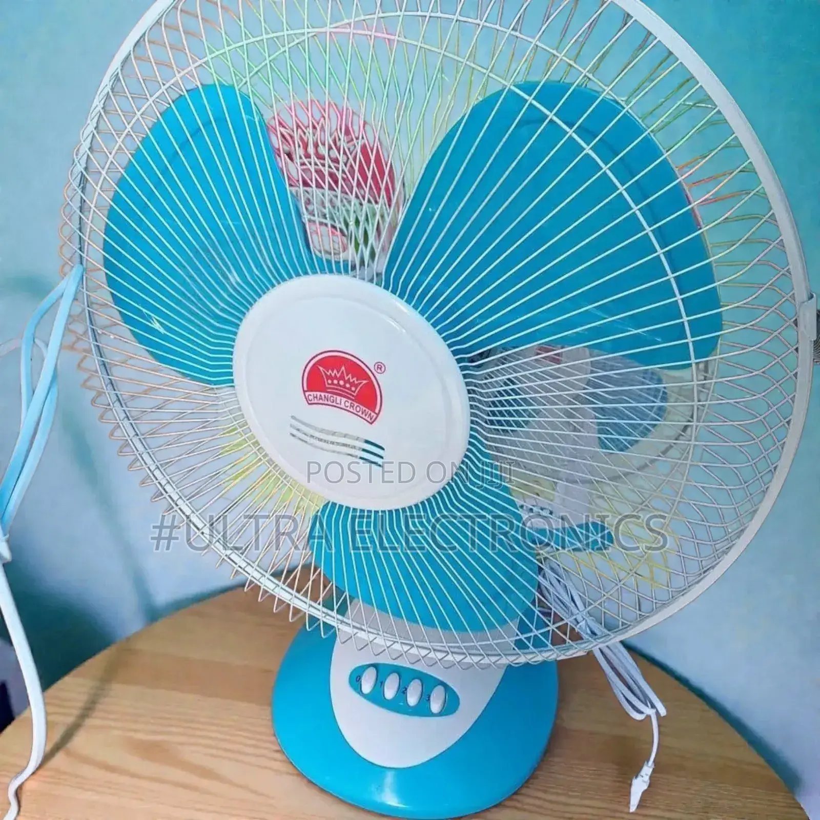 Changli Crown Table Fan. It Is a Plastic Electric Fan, Typically