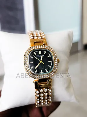 Gold-Tone, Diamond-Accented Watch With a Black Dial,