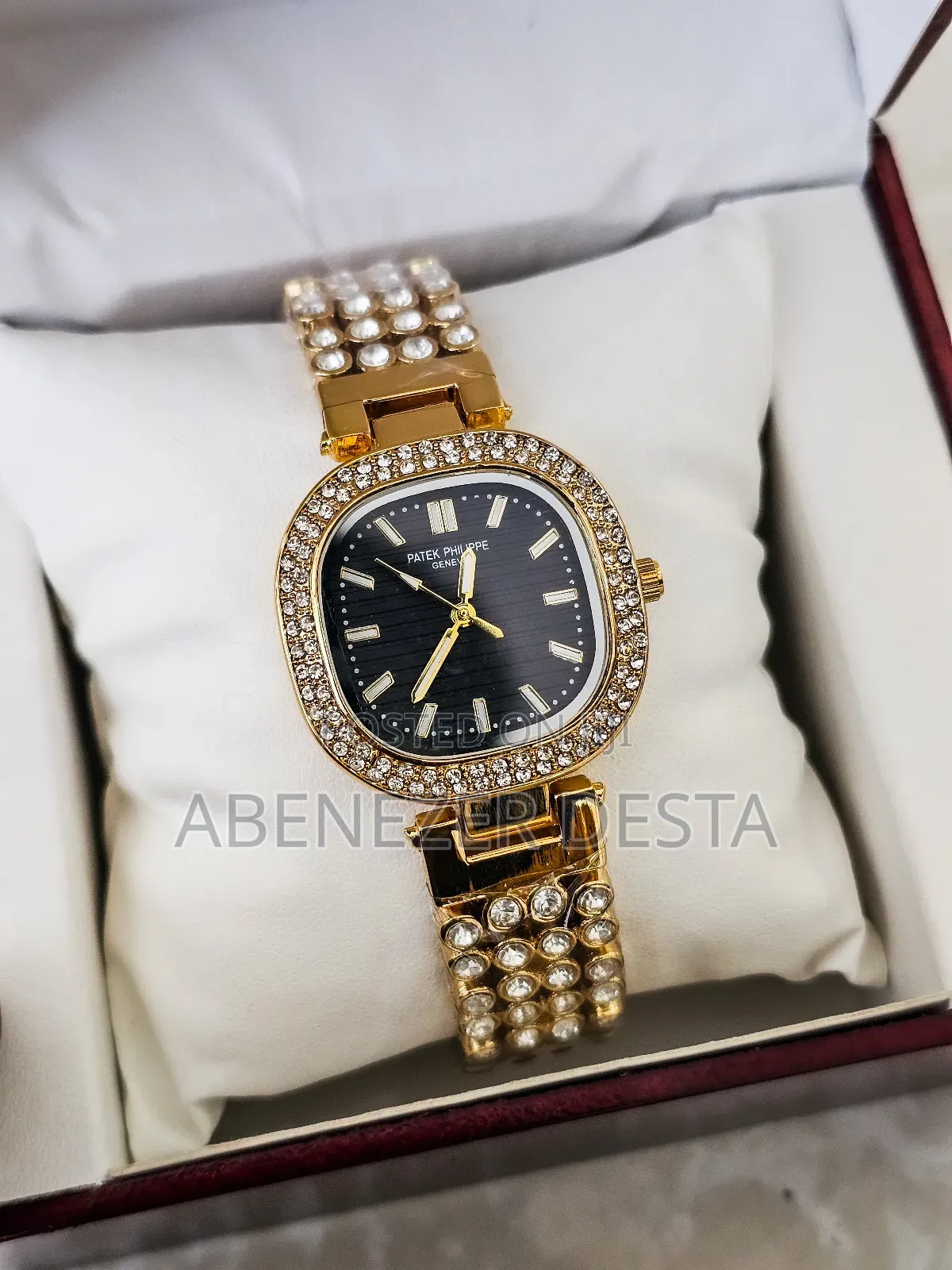 Gold-Tone, Diamond-Accented Watch With a Black Dial,