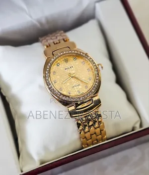 Gold-Tone Rolex Datejust Watch With a Diamond Bezel and Diamond