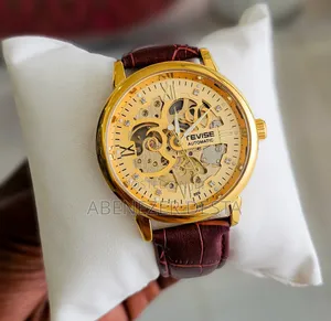 Gold-Tone Tevise Automatic Mechanical Skeleton a Brown Leather Strap.