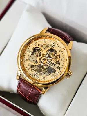 Gold-Tone Tevise Automatic Mechanical Skeleton a Brown Leather Strap.