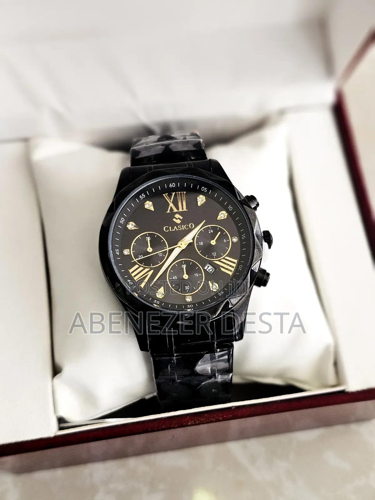 Black Stainless Steel Clasico Quartz Watch With Chronograph Features.