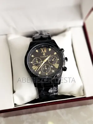 Black Stainless Steel Clasico Quartz Watch With Chronograph Features.