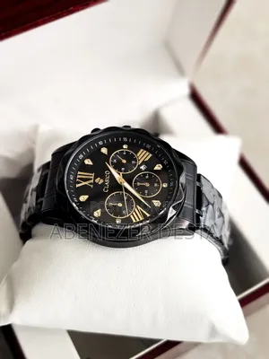 Black Stainless Steel Clasico Quartz Watch With Chronograph Features.
