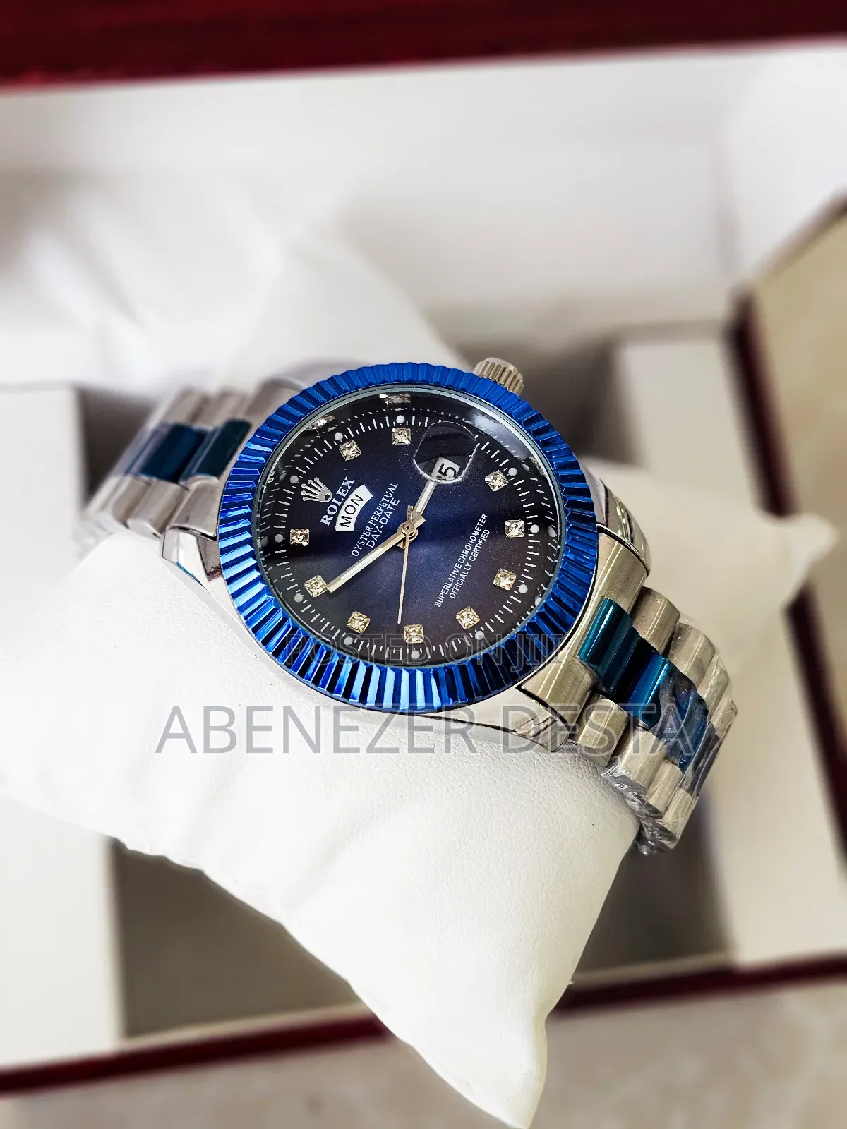 Rolex Day-Date Watch With a Blue and Silver Two-Tone Design and Diamon