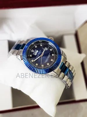 Rolex Day-Date Watch With a Blue and Silver Two-Tone Design and Diamon