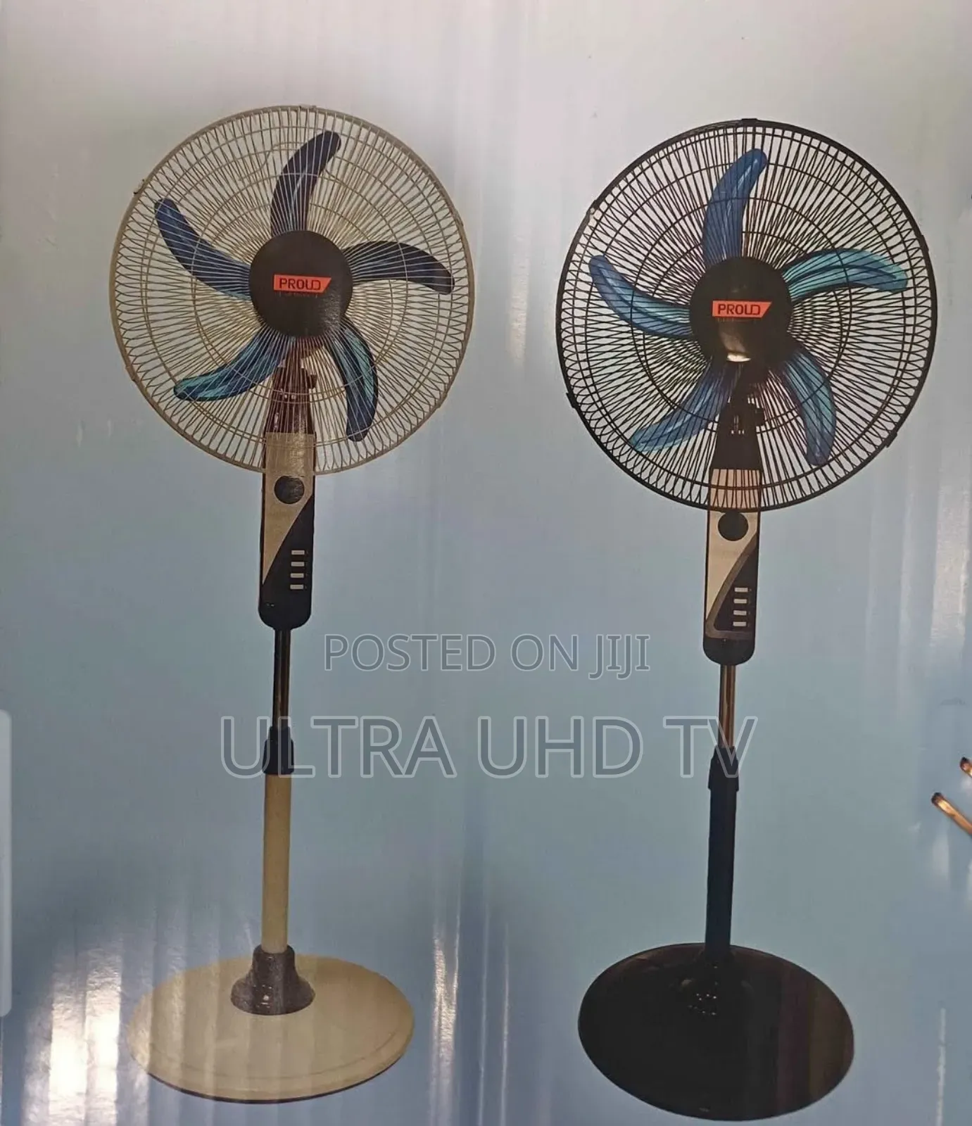 Prold-Branded Electric Stand Fans. They Feature 5 Blue Blades Behind