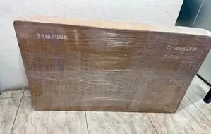 Samsung Crystal Uhd Du7000 Smart Tv in Its Box.