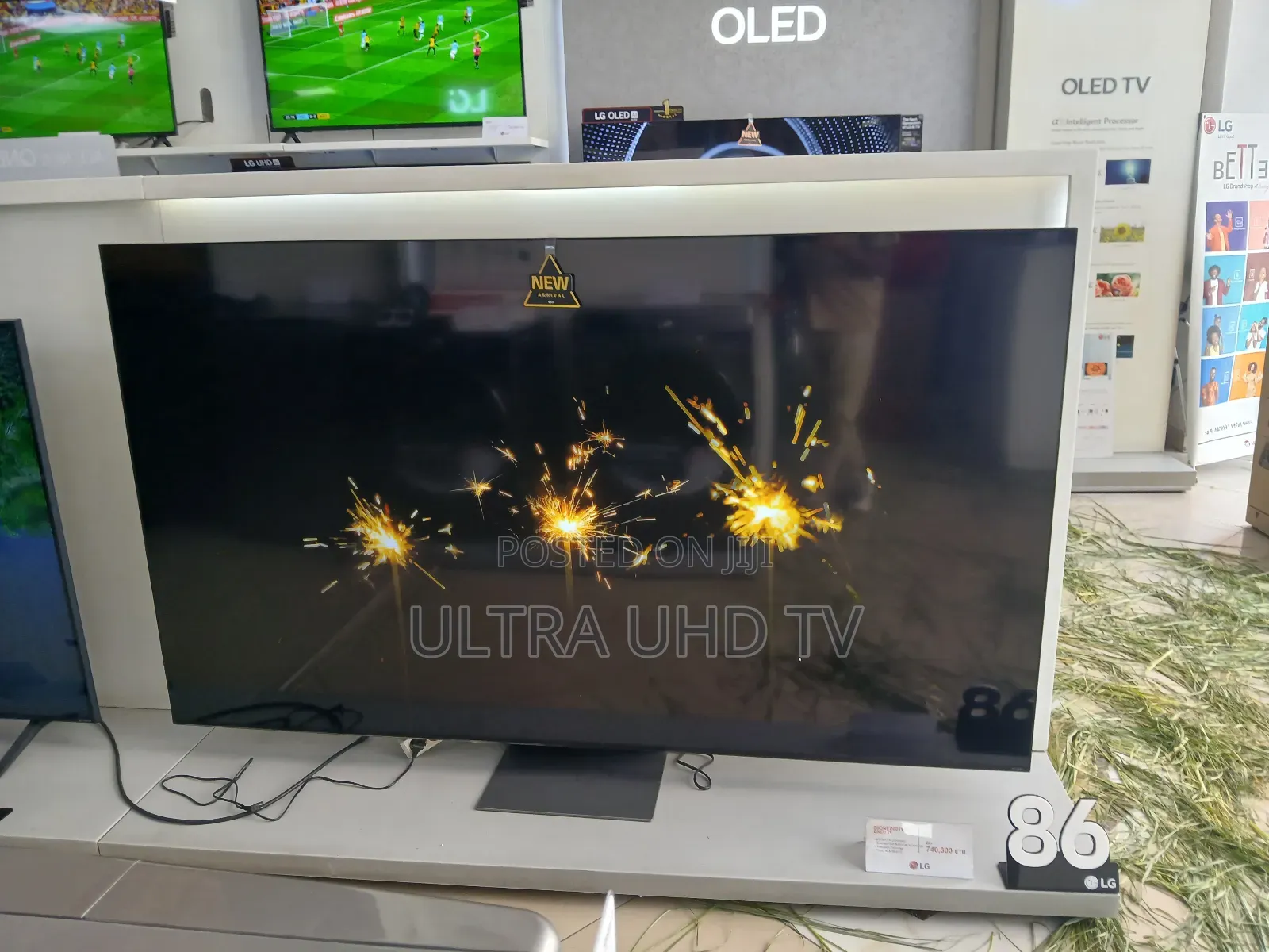 Lg 86-inch Lg Tv, Likely A Model, Displayed In A Retail Setting.