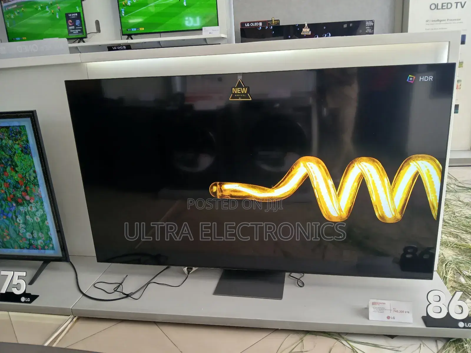 Lg 86-inch Lg Tv, Likely A Model, Displayed In A Retail Setting.