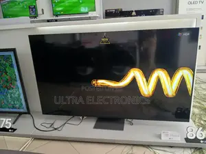 Lg 86-inch Lg Tv, Likely A Model, Displayed In A Retail Setting.