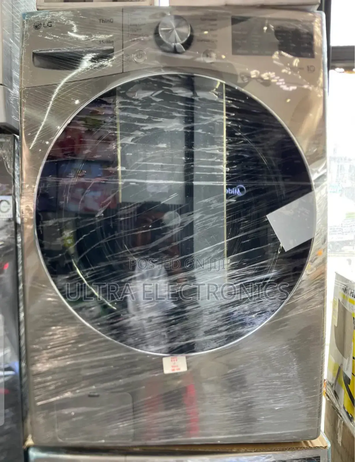 Lg Front-Load Washer-Dryer Combo Unit. It Features Lg Thinq and Ai Dd