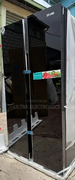 Ice Land Side-by-Side Refrigerator. It Has a Black Glass Finish And