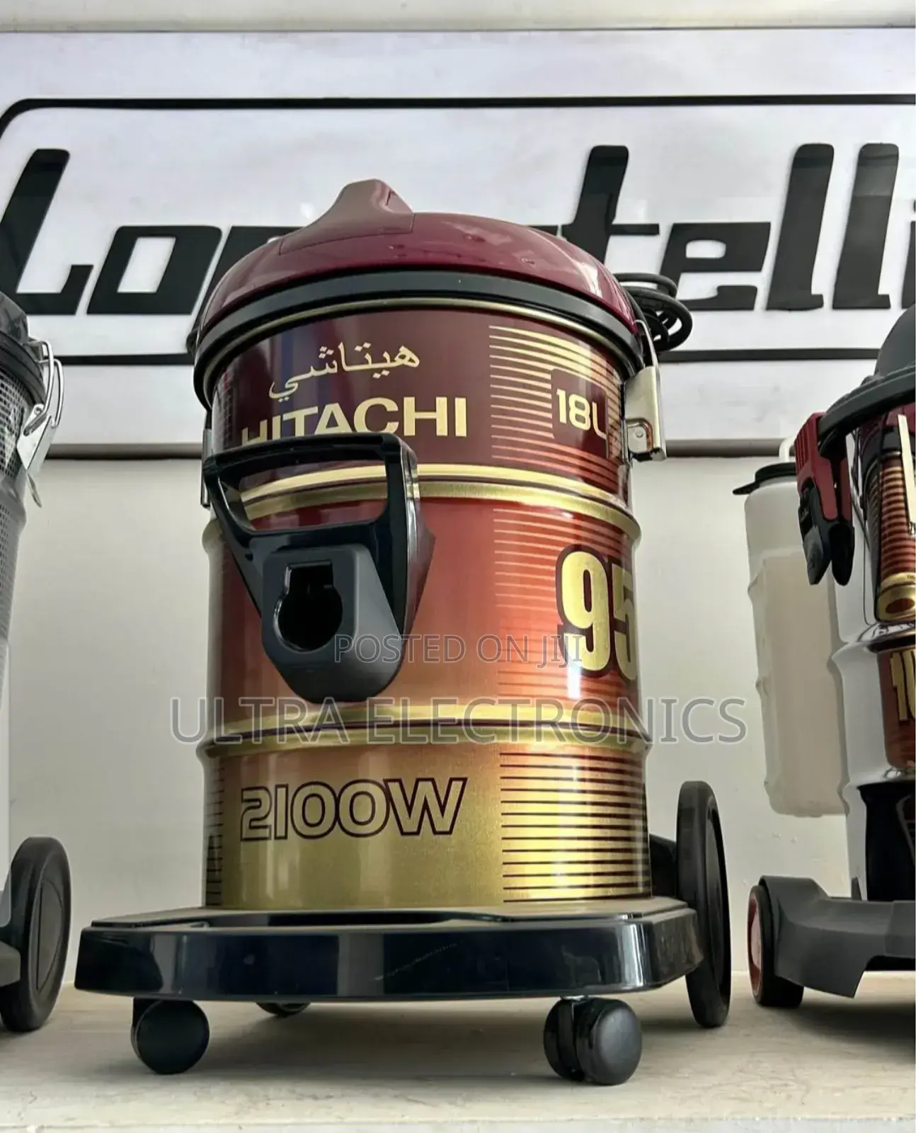 Hitachi Cv-950f Drum Vacuum Cleaner in a Wine Red and Gold Finish.
