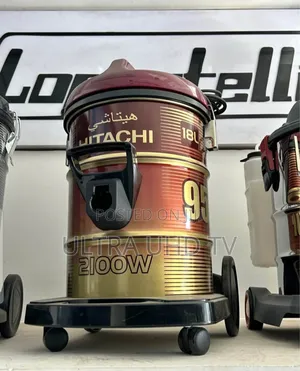 Hitachi Cv-950f Drum Vacuum Cleaner in a Wine Red and Gold Finish.