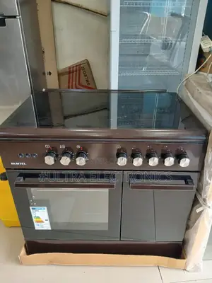 Kumtel Standing Oven/Cooker, Likely a 60x90 Cm Model With Both Gas