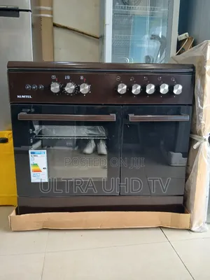 Kumtel Standing Oven/Cooker, Likely a 60x90 Cm Model With Both Gas