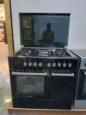 Kumtel Brand Free-Standing Gas and Electric Cooker.