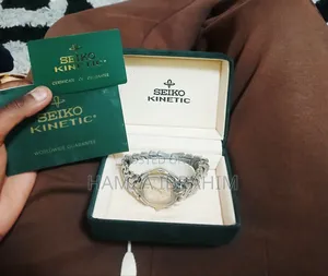 Seiko Kinetic Sq 100 Gold Silver Combination