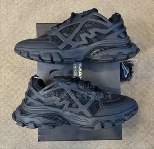 Range Runner" Sneakers by the Brand Moonlight Mansion