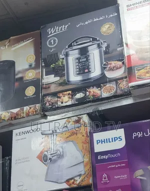 WTRTR Electric Pressure Cooker. Items Include a Kenwood Food Mincer