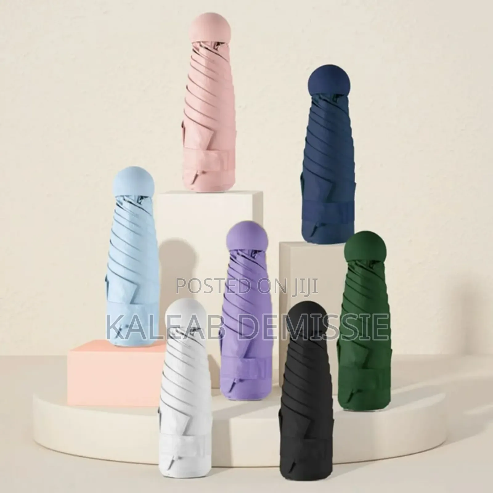 Mini Uv Resistant Pocket Umbrella ሞባይል ስልክዎን የምታክል ከፀሃይና ከዝናም ጃንጥላ