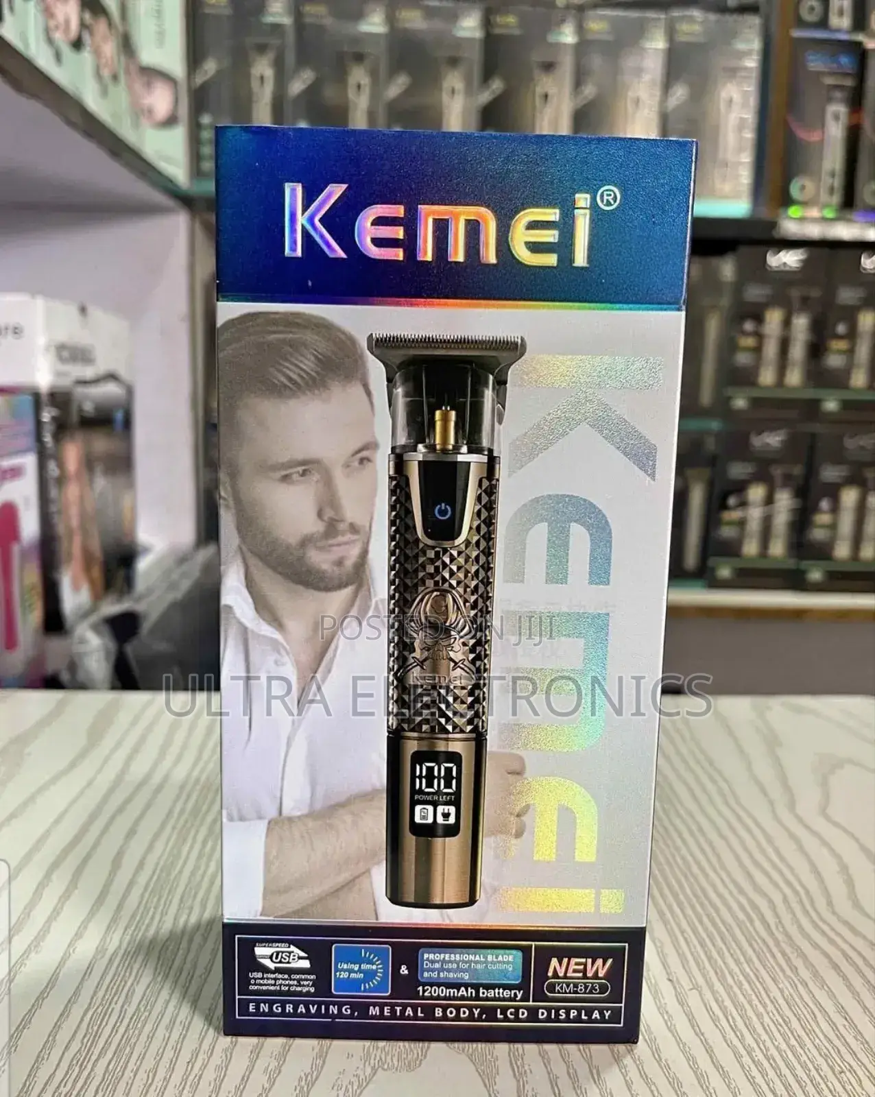 Kemei Km-873 Rechargeable Hair Clipper. It Has a Metal Body Design