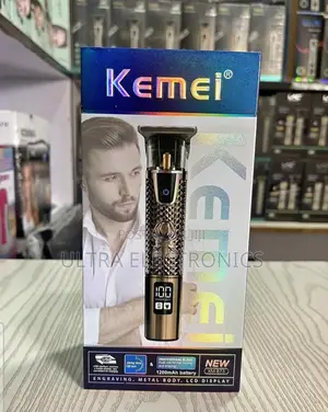 Kemei Km-873 Rechargeable Hair Clipper. It Has a Metal Body Design