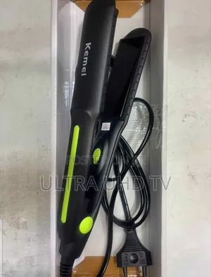 Kemei Km-2118 Hair Straightener. It Features Ceramic Plates.