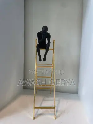 Man Sitting on the Ladder Thinking Statue