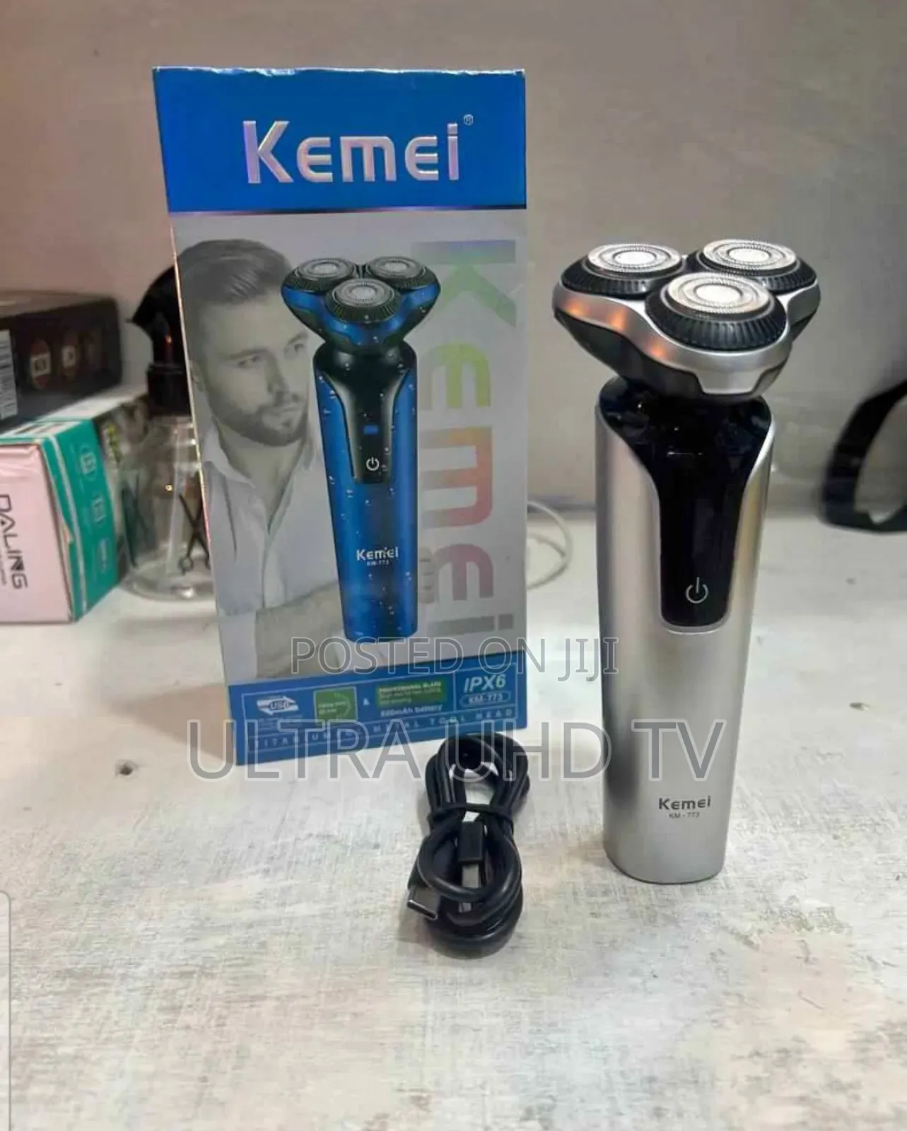 Kemei Rechargeable Electric Shaver (Likely Model Km-833).