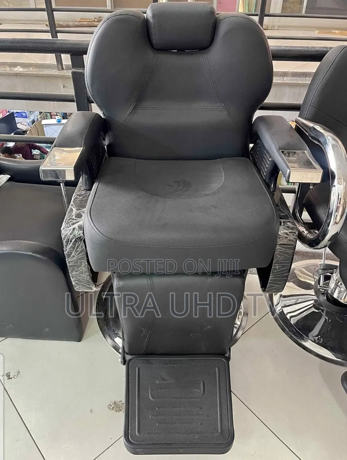 Black Faux Leather Hydraulic Reclining Barber Chair With a Footrest